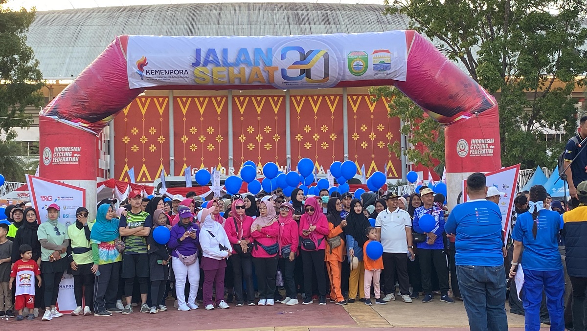 Meriah! Puluhan Ribu Warga Ikuti Jalan Sehat HUT ke-30 Sumatera Ekspres di Jakabaring