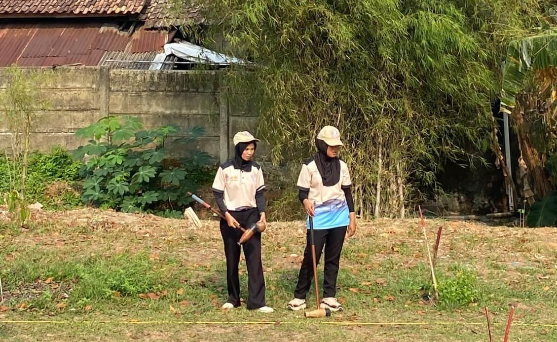 Devin dan Muti Raih Medali Emas Kategori Double Stroke Putri Turnamen Woodball Piala Pangdam II Sriwijaya