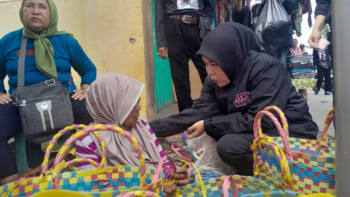 Pedagang Pasar Modern Plaju Taruh Harapan Besar pada Pasangan Fitri-Nandri