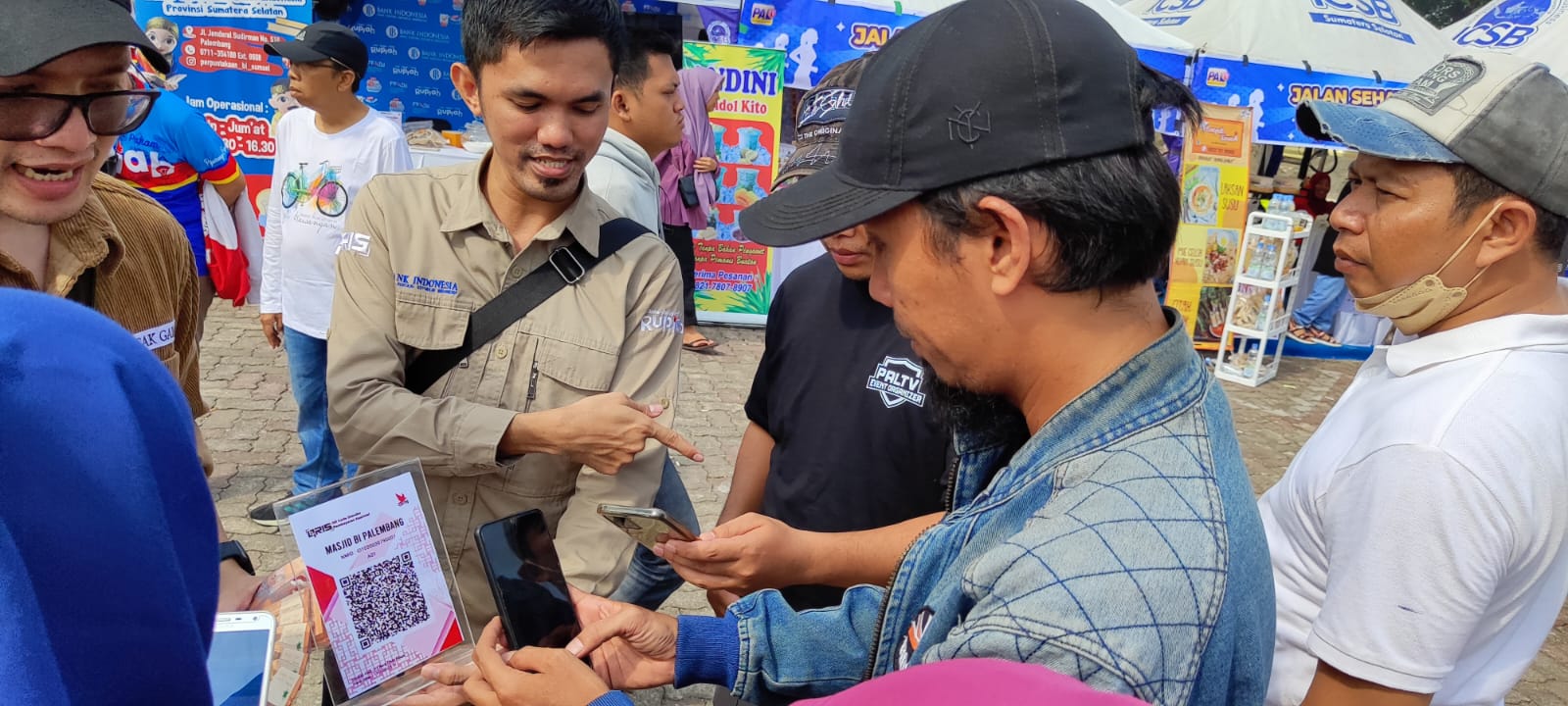 Ramaikan Jalan Sehat Gebyar UMKM Sumsel PALTV, Bank Indonesia Bagi-Bagi Uang Transaksi Menggunakan Qris 