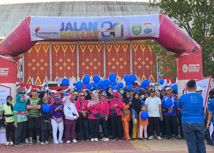 Meriah! Puluhan Ribu Warga Ikuti Jalan Sehat HUT ke-30 Sumatera Ekspres di Jakabaring