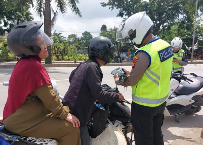 Tilang Pakai Handphone Mulai Berlaku di Palembang
