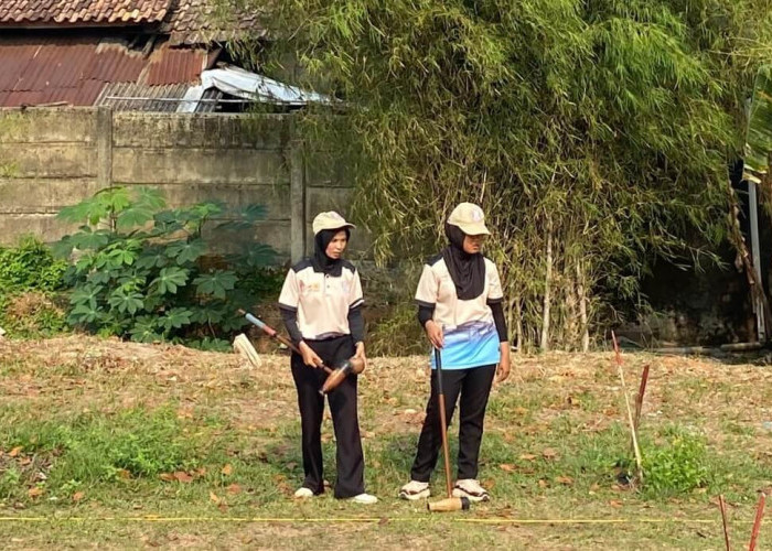 Devin dan Muti Raih Medali Emas Kategori Double Stroke Putri Turnamen Woodball Piala Pangdam II Sriwijaya