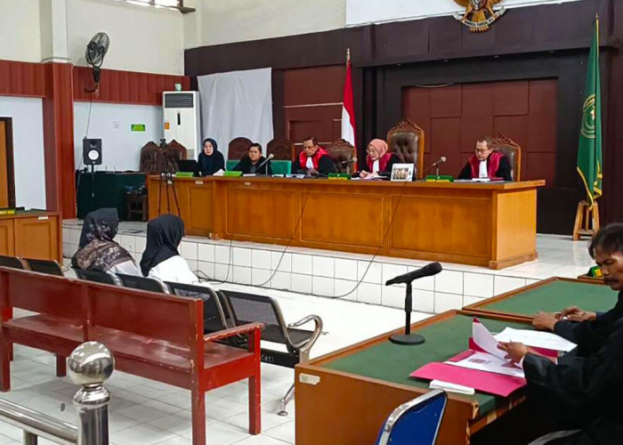 Asnaifah dan Kartila, 2 Terdakwa Penerbitan Ratusan Sertifikat PTSL 2019 Jalani Sidang Dakwaan