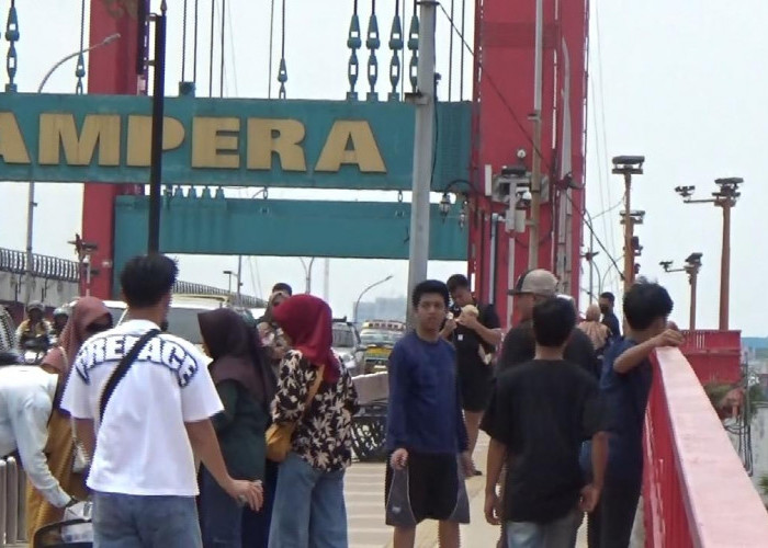 Bukan Sekadar Ikon,Jembatan Ampera Jadi Spot Foto Favorit dari Luar Palembang