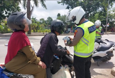 Tilang Pakai Handphone Mulai Berlaku di Palembang