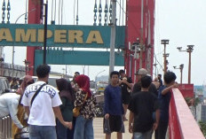 Bukan Sekadar Ikon,Jembatan Ampera Jadi Spot Foto Favorit dari Luar Palembang